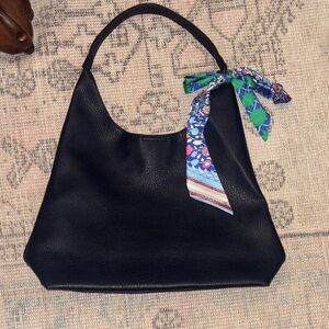 Elegant Navy Tote with Floral Scarf Accent